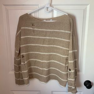 Distressed stripe sweater